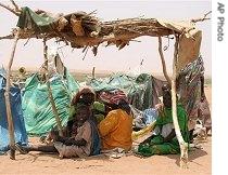 Darfur refugees in this derelict section of Es Sallam camp say they have been waiting nine months to be relocated to decent shelters, 25 Mar 2007 