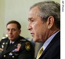 President Bush makes a statement on the war in Iraq in White House, 23 Apr 2007. With him is Gen. David Petraeus, commander of the multinational force in Iraq