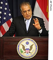 departing U.S. ambassador to Iraq Zalmay Khalilzad gestures during a press conference in the heavily fortified Green Zone in Baghdad, 26 Mar 2007