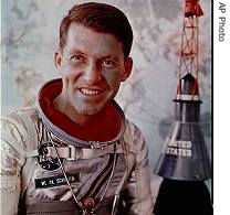 Astronaut Walter M. Schirra Jr. is shown posed for a studio portrait in his space suit in this June 1962 file photo