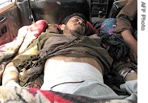 Man injured in Helmand province raid lies in vehicle en route to hospital, 09 May 2007