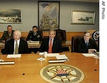 U.S. President Bush (center)seated between Defense Secretary Robert Gates (l) and National Security Adviser Stephen Hadley, at the start of their meeting at the Pentagon, 10 May 2007
