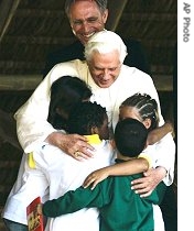 Pope Benedict XVI hugs children during a visit to a drug rehabilitation center called 'Fazenda da Esperanca' or Farm of Hope in Guaratingueta, Brazil, 12 May 2007
