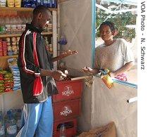 Some Senegalese save money at corner shops like this one
