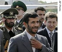 Iranian President Mahmoud Ahmadinejad, center, walks upon his arrival in Minsk, Belarus, 21 May 2007