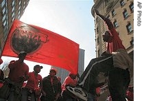 Strikers take part in a civil servants' protest march in downtown Johannesburg , 01 June 2007