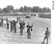 Israeli soldier lines up captured Egyptian troops to be checked for identification, 06 Jun 1967