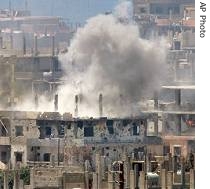 Smoke rises from the heavy shelling during the Lebanese army offensive at the Palestinian refugee camp of Nahr el-Bared in the north, 06 Jun 2007