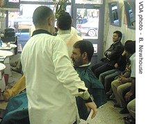 'Bashar' at work in an Irbil barbershop