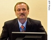 Former rebel Croatian Serb leader Milan Martic attends a session of the UN war crimes tribunal in The Hague, 12 June 2007