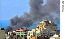 Smoke rises during fighting between Fata and Hamas factions in Gaza City