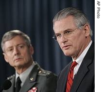 Principal Deputy Under Secretary of Defense for Policy Ryan Henry, right, and Lt. Gen. Walter Sharp, Director of the Joint Staff, discuss the establishment of US Africa Command (File Photo)