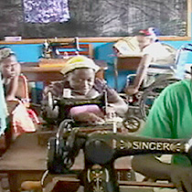 Handicapped students learn to use sewing machines