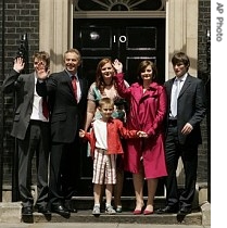Britain's Prime Minister Tony Blair, second left, leaves No. 10 Downing Street for the last time as Prime Minister, as he stands with family in central London, 27 June 2007