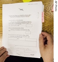 Central Intelligence Agency's secret documents of the agency's contacts with other US government agencies, shows some deleted portions in blank boxes, at the National Security Archives, 26 June 2007