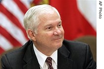 Robert Gates speaks with the media at NATO headquarters in Brussels, 15 June 2007