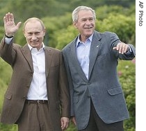 President George W. Bush greets Russian President Vladimir Putin at Walker's Point, the Bush family compound in Kennebunkport, Maine