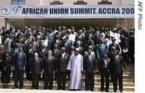 Heads of state and government pose for a group photo at the international conference centre in Accra, 01 Jul 2007, after the opening of the African Union summit