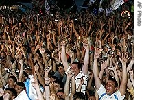 Thousands of spectators burst in cheers and applause as the Russian resort city of Sochi becomes the host of the 2014 winter games, 05 Jul 2007