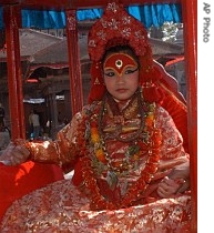 Nepalese living goddess, locally known as Kumari, is taken through the capital on a chariot carried by devotees in Katmandu, Nepal, 18 March 2007