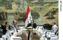Iraqi Prime Minister Nouri al-Maliki, center, presides over cabinet meeting in Baghdad, 03 Jul 2007