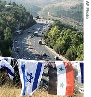 Israeli and Syrian flags, hung by left-wing Israeli activists from the Peace Now organization, are seen at the entrance to Jerusalem 10 Jul 2007