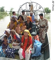 Pakistani rangers rescue stranded villagers from fllood-hit areas in Kahirpur Nathan Shah near Hyderabad, Pakistan, 13 July 2007