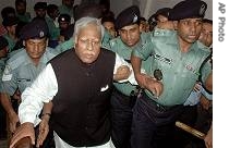 Police escort General Secretary of Sheikh Hasina's Awami League Party Abdul Jalil, front left, to a court in Dhaka (File Photo)