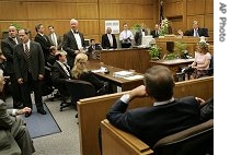 Judge admonishes people in the audience to stop heckling at Los Angeles court where $660 million settlement approved between Roman Catholic Archdiocese of Los Angeles and more than 500 alleged victims of clergy abuse, 16 July 2007 
