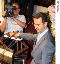 Syria's President Bashar Assad is sworn in for a second term in office, in Damascus, 17 July 2007