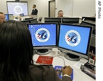 Personnel work in an unsecured training area of the Los Angeles Joint Regional Intelligence Center (file photo)