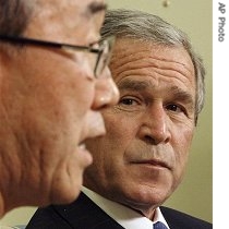 President Bush, right, listens to UN Secretary General Ban Ki-moon,  during their meeting in the Oval Office of the White House, 17 July 2007