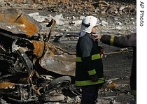 Firefighters work at the site where a TAM airlines jet crashed Tuesday killing at least 189 people in Sao Paulo, Brazil, 19 July 2007