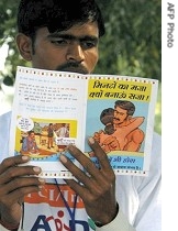 Indian activist reads 'safe-sex' booklet (file photo)