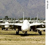 Several of the mothballed F-14 Tomcat fighter jets await demolition at Davis-Monthan Air Force Base Monday, June 11, 2007, in Tucson, Arizona