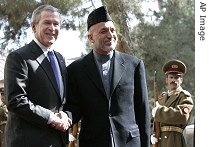 Presidents George W. Bush and Hamid Karzai at the presidential palace in Kabul, Afghanistan, Wednesday