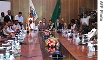 Unidentified officials from the Chadian government and rebel leaders hostile to President Idriss Deby meet in Tripoli, Libya, 21 June 2007