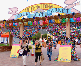 Susan Logue Koster::More than 17,000 people came to shop at the Santa Fe International Folk Art Market this year; many lined up hours before the market opened.