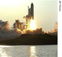 Shuttle Endeavour lifts off launch pad