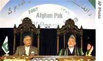 Pakistani Prime Minister Shaukat Aziz, left, and Afghan President Hamid Karzai attend meeting to discuss rising border violence, 09 Aug 2007 
