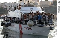 Some 220 illegal immigrants arrive in the southernmost Italian island of Lampedusa after being intercepted by Italian coast guards, 19 Jul 2007