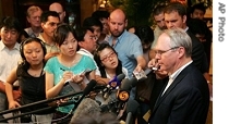 U.S. Assistant Secretary of State Christopher Hill, right, briefs reporters in a hotel in Beijing Monday 13 Aug. 2007