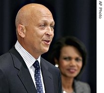 Cal Ripken Jr., left, becomes a 'special sports envoy' during ceremony with Secretary of State Condoleezza Rice, right, at the State Department in Washington, 13 Aug 2007