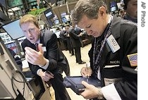 Specialist James Maher, left, directs trading in shares of Countrywide Financial on floor of the New York Stock Exchange, 10 Aug 2007 