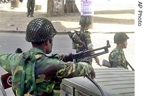 Military guards patrol during curfew in Dhaka, Bangladesh, 23 Aug 2007