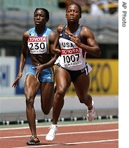 Lauryn Williams (1007) races with Bahamas' Timicka Clarke in a heat of the Women's 100m dash at the World Athletics Championships, 26 Aug 2007