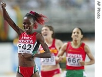 Kenya's gold medal winner Janeth Jepkosgei celebrates during the Women's 800m at the World Athletics Championships, 28 Aug. 2007