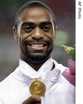 United States' Tyson Gay displays his gold medal during the medal ceremony for the Men's 200m at the World Athletics Championships, 31 Aug. 2007