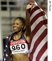 Allyson Felix of the US celebrates after winning the gold medal in the Women's 200m during the World Athletics Championships, 31 Aug. 2007