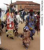 Drummers accompany worshipers through the Sacred Forest, Nigeria, 31 Aug 2007